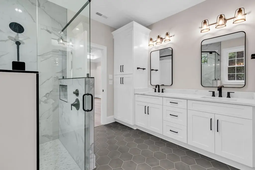 Primary bathroom design example showing how guided choices help homeowners avoid custom home decision fatigue.