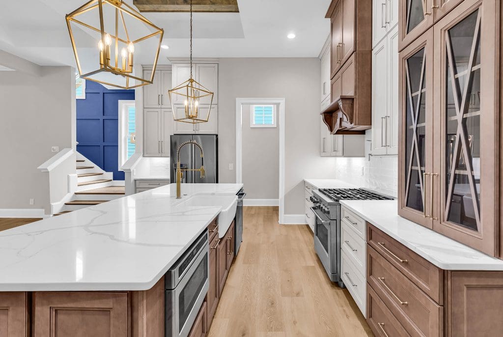 Elegant, elevated kitchen design showcasing smart planning elements that help prevent new construction regrets.