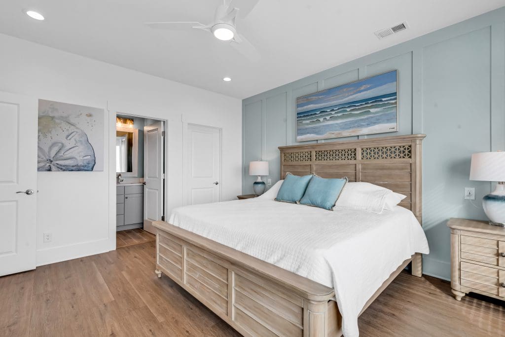 Comfortable bedroom on the first floor illustrating important factors in how to choose a floor plan for accessible and convenient living.