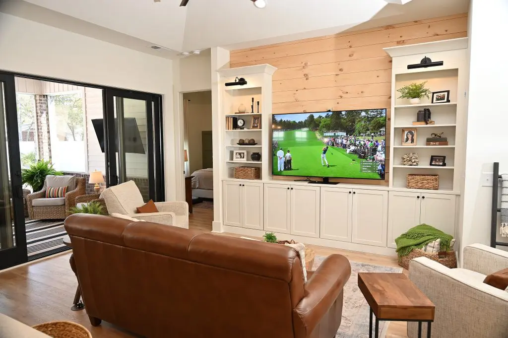 Living room opening to outdoor patio, demonstrating seamless indoor-outdoor flow with outdoor living space ideas.
