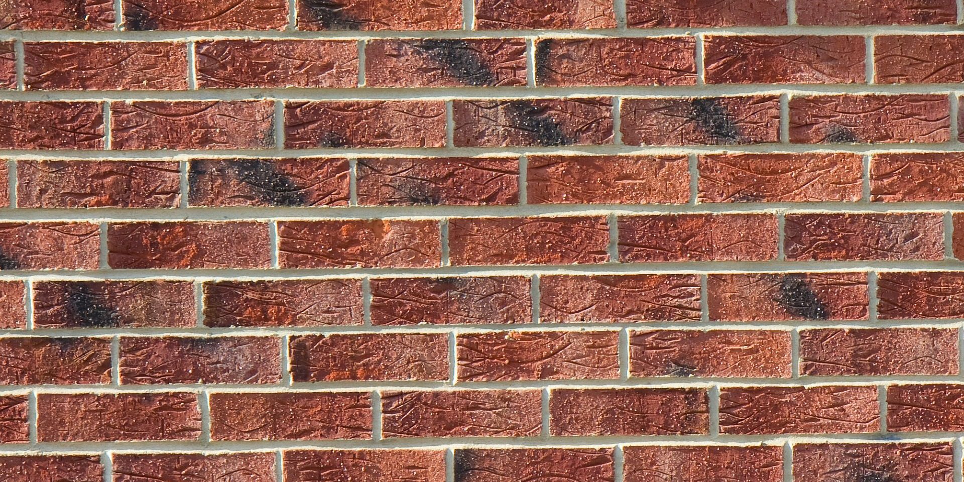 What Are the Differences Between Brick and Hardie Plank Siding? Swift