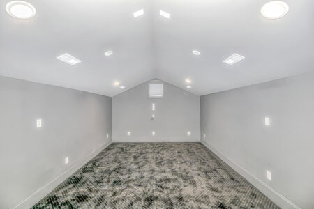movie room of Isle of Palms 1 home by swift creek homes