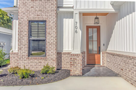 exterior front of Atlantic Beach home by swift creek homes