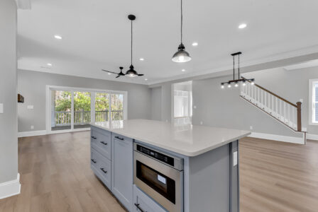 kitchen and living room of Streater home by swift creek homes