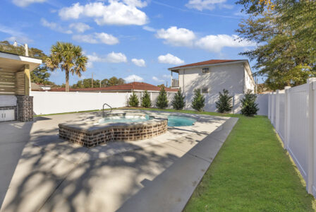 exterior backyard pool of Atlantic Beach 2 home by swift creek homes