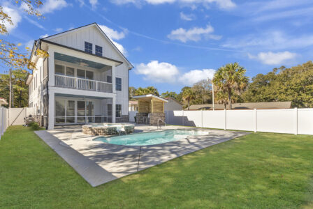 exterior backyard pool of Atlantic Beach 2 home by swift creek homes