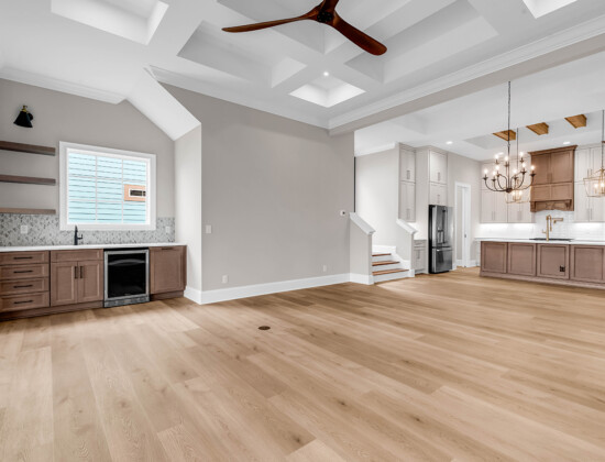 living room and kitchen of Waterbridge home by swift creek homes