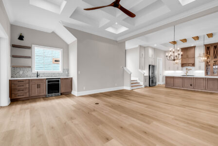 living room and kitchen of Waterbridge home by swift creek homes