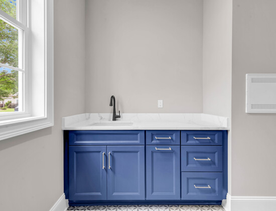 utility laundry room of Waterbridge home by swift creek homes
