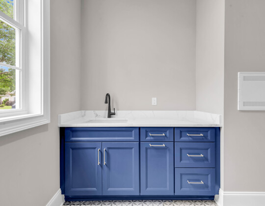 utility laundry room of Waterbridge home by swift creek homes
