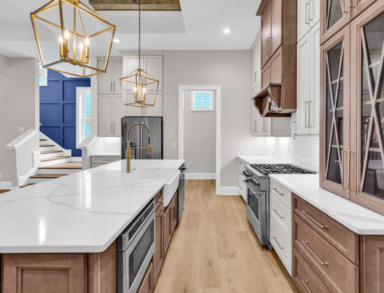 Elegant, elevated kitchen design showcasing smart planning elements that help prevent new construction regrets.