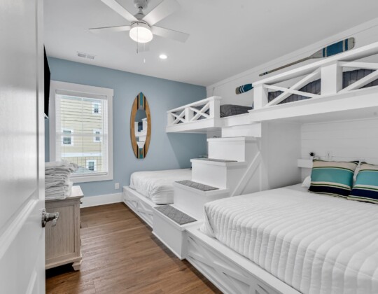 bunk room of S Ocean home by swift creek homes