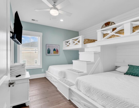 bunk room of S Ocean home by swift creek homes