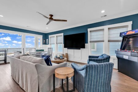 game room and loft of S Ocean home by swift creek homes