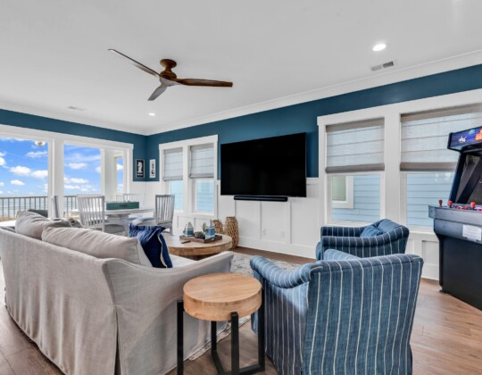 game room and loft of S Ocean home by swift creek homes