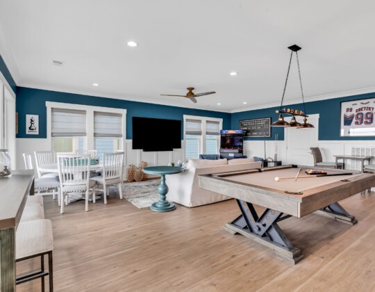 game room and loft of S Ocean home by swift creek homes