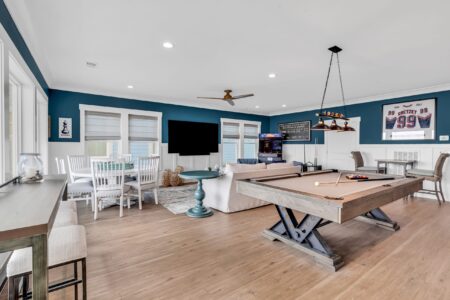game room and loft of S Ocean home by swift creek homes
