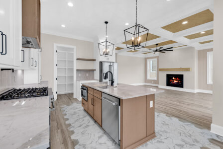 Spacious kitchen and living area highlighting what’s possible when deciding to build now.