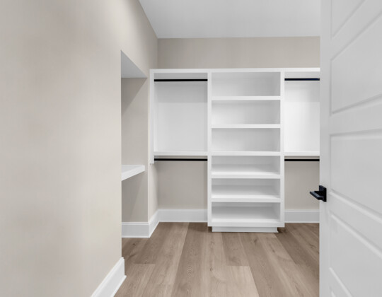 primary bedroom closet of Whispering Winds home