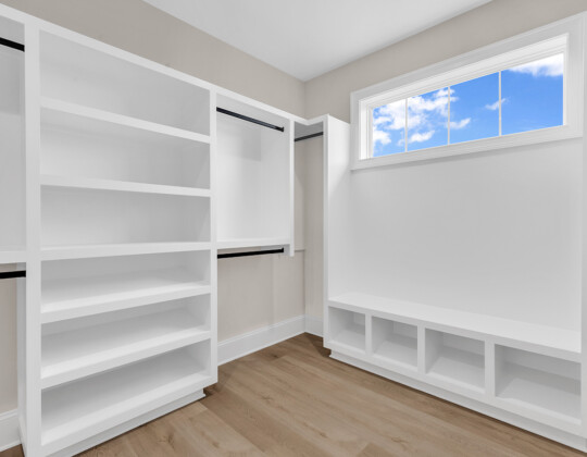 primary bedroom closet of Whispering Winds home