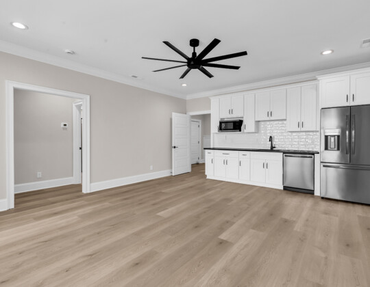 guest suite living room and kitchenette of Whispering Winds home