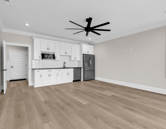 guest suite living room and kitchenette of Whispering Winds home
