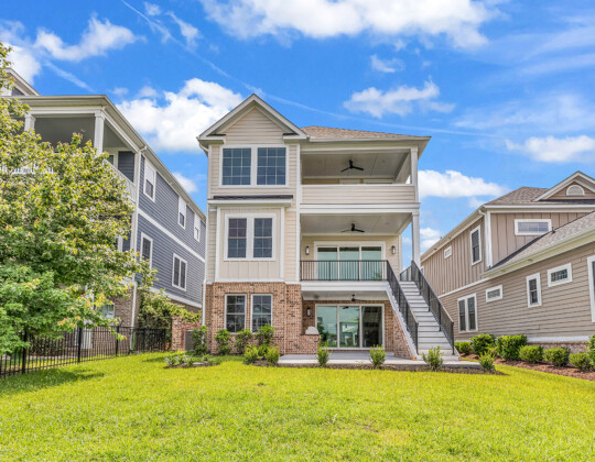 rear exterior of Whispering Winds home
