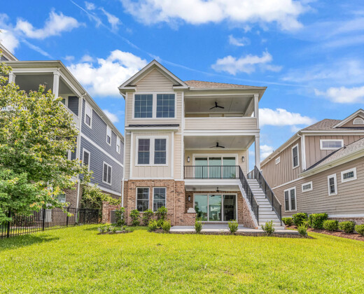 rear exterior of Whispering Winds home