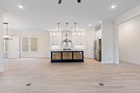 interior kitchen and living room of W Palm 1 home