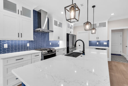 Blue coastal kitchen design illustrating how to simplify choices and reduce custom home decision fatigue.