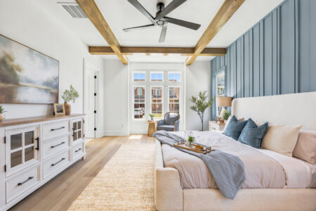 Spacious primary bedroom featuring thoughtful retirement home features in a custom Myrtle Beach retirement home.